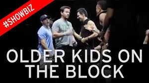Wahlberg embraced and shook hands with everyone on the stage and checked out the crowd; Watch The Moment Marky Mark Reunites With New Kids On The Block Mirror Online