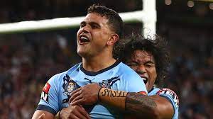 Latrell mitchell of the blues celebrates after scoring a try during game two of the 2021 state of origin series. Skc4ks7rqlwvnm
