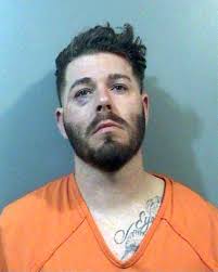 Police: Man hit parked car, backed into cop car, fought with officers