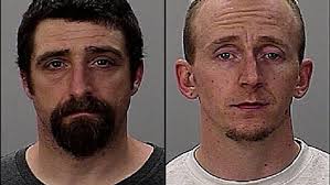 Duo accused of posing as police to rob man