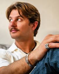 People hatin'. Brandon Coleman, Andrew Bishop, Zachary Rishel, and John  Hall of the Red Clay Strays wear custom John Rader bracelets during their  performance at The Warfield in San Francisco, California. Captured