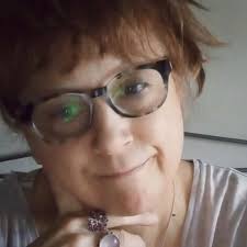 A wonderful shot looking upwards from underneath the EIFFEL TOWER at night.