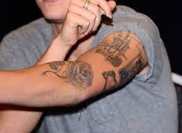 4.8 out of 5 stars: Harry Styles Tattoo Guide Harry Styles Tattoos Meanings Explained