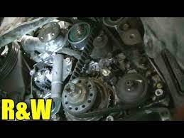 How To Remove And Replace The Timing Belt And Water Pump Mitsubishi 2 4l Sohc Engine Part 2 Repair Videos Repair Timing Belt