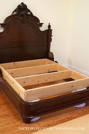 We Got This Fantastic Antique Bed On Craigslist But It S Only A Full Size See How We Retrofitted It To Accommodat Antique Beds Diy Bed Queen Mattress Size