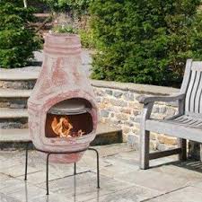 Cooking pizza in a chiminea fire pit, on christmas eve. Fire Pit Handmade Clay Chiminea By Sol Y Tierra Pottery Sol Y Tierra