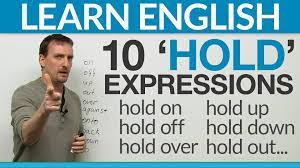 Hold On To Your Hats Excitement Is On The Way In This English Lesson Well Go Over Some Uses Of Hold Preposition Learn English Phrasal Verb English Phrases