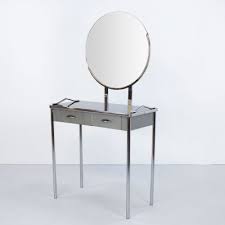 Metal finishes are done by hand and may be subject to small variations. Italian Dressing Vanity With Mirror Horse Legs 1959 82964