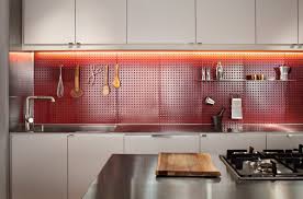 Peel sticky tile is a creative decoration for cheap kitchen backsplash ideas. Clever Red Pegboard Backsplash In A Remodeled Kitchen Collection Of 5 Photos By Allie Weiss Dwell