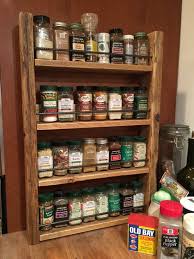 Then attach the shelves with wood glue and 1 1/4 wood screws from the back of the spice rack. Rustic Wood Spice Rack Storage For Spice Jars Perfect For Gifts And Cooking Lovers Various Finishes Wall Mounted Or Free Standing Wood Spice Rack Spice Rack Storage Spice Jar Storage