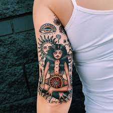 Traditional Style Tattoo Of A Meditating Girl Inked On The Back Of The Left Upper Arm Traditional Style Tattoo Arm Tattoos For Women Sleeve Tattoos
