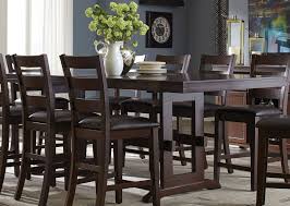 Counter height dining sets are perfect for a spacious dining room. Holbrook Antique Tobacco Extendable Counter Height Dining Table