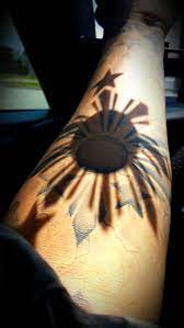 Filipino tribal tattoo on right half sleeve. 64 Amazing Filipino Tattoos
