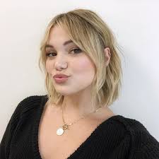 The hairstyle as the name implies are longer till your neck, and they are the hairstyle is textured over the top as well as the sides to make contrast through the back which is clipper cut short blonde hair with a textured fringe. Pin On Olivia Holt
