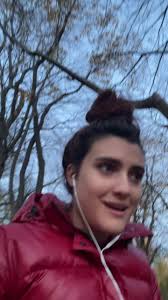 Enjoying the Autumn Outdoors in a Red Puffer Jacket