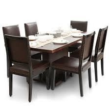 Grey/brown solid wood trestle dining table. Bocado Caprica 6 Seater Dining Table Set Thearmchair