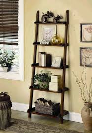Wildon Home Strong Wildon Home Strong Leaning 76 Bookcase Shelf Decor Living Room Ladder Shelf Decor Bookcase Decor This piece features four wide shelves for display and four small drawers to keep.
