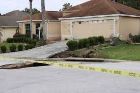 Next you put a layer of stones in the hole then another layer of smaller rocks on top of the stones. Sinkhole Nightmare In The Villages Ranks As Top Story Of 2018 Villages News Com