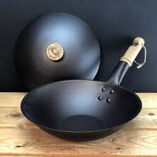 7/16 is 11 millimetresanswerthere are about 25 mm in an inch, so 11 mm is a bit less than a half inch. 11 28cm Spun Iron Small Wok With Lid