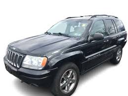 Image result for Brilliant Black 2003 Jeep