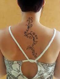 Tatouage bas du ventre homme. Tatouage Arabesque Mademoiselle Web
