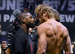 Floyd mayweather, left, and logan paul face off during a press event thursday, june 3, 2021, in miami beach, fla. Tvwdwxe8ohhngm