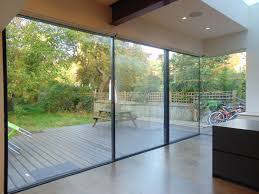 A simple sink and mirror with little storage was replaced with much larger custom designed cabinets, matching mirror, shelves and lighting. Sliding Doors Bifold Doors With 90 Degree And 135 Degree Moving Corner Posts 1st Folding Sliding Doors