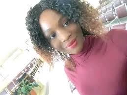 A New York City police officer poses hanging in Times Square, 1920.