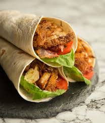 The Chicken In These Wraps Are Coated In A Crispy Breadcrumb And Seasoned In A Southern Fried Style Th Crispy Chicken Wraps Chicken Wraps Chicken Wrap Recipes