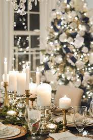 This will make you look classy over the festivity with the chandeliers and candle lights. Elegant Christmas Dining Room With Christmas Dinner Idea Pecan Crusted Elegant Christmas Centerpieces Christmas Dining Table Decor Christmas Table Decorations
