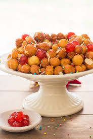 Cute little balls of fried dough are coated in sweet honey and topped with your favorite holiday sprinkles. Struffoli Italian Honey Balls An Italian In My Kitchen