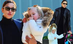 Irina shayk put on a fashion show as she walked her daughter, lea de seine, to school. Irina Shayk Is One Multi Tasking Mom As She Carries Daughter Lea And Pushes Toddler S Doll Stroller Daily Mail Online