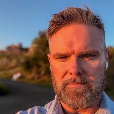 A man with a flashlight entered Marie Columna's home and was captured