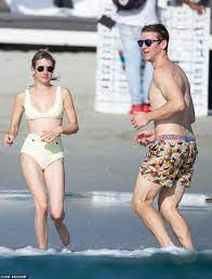 Emma Roberts playfully wraps her legs around a male friend while hitting  the beach in Punta Mita | Daily Mail Online