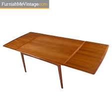Featuring new light grey fabric upholstery and. Danish Teak Dining Table By Arne Vodder
