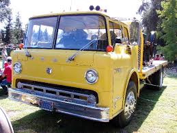Image result for Bright Yellow 1990 Truck
