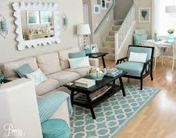 Beige Aqua Decor To Create A Calm Breezy Beach Ambiance Shop The Look Beach Theme Living Room Coastal Decorating Living Room Beach Living Room