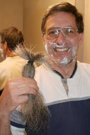 U.S. man shaves beard after vow to keep it until bin Laden caught