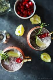 Cranberry Moscow Mule With Rosemary Infused Vodka You Ll Love This Holiday Twist On A Classic A Cranberry Moscow Mule Recipe Cranberry Moscow Mule Mule Recipe