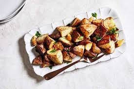 Garlic Roasted Potatoes Recipe Garlic Roasted Potatoes Potato Recipes Roasted Potatoes