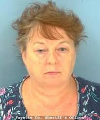 Mother of child molestation suspect charged with obstruction