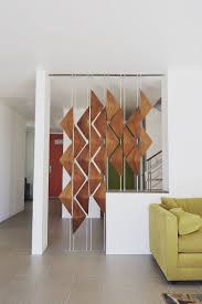 Modern Room Dividers The Walnut Window Shades Act As A Screen Between This Living Room And Entry Paredes De Divisorias Design De Sala De Estar Sala De Design