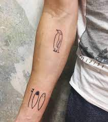 Surf tattoo with board (source). I M So Happy Great Result Even Better Then Expected Thanks To Anntalala And Inklabs Great Artist And Studio Surf Tattoo Surfer Tattoo Penguin Tattoo