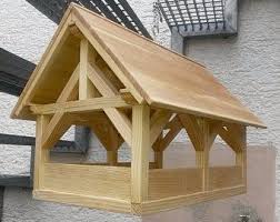 Vogelfutterhaus Aus Holz In 2020 Wooden Bird Feeders Bird House Bird Houses