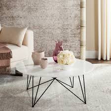 The mod coffee table combines bent legs with round, low profile top. Safavieh Maris Retro Mid Century Round Coffee Table Walmart Com Walmart Com