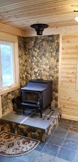 Tiled floor surface or glass laid onto carpet/wood floor etc.). Hand Picked River Stone Over Tile Board Woodstove Hearth Wood Stove Wall Wood Stove Hearth Wood Burning Stoves Living Room