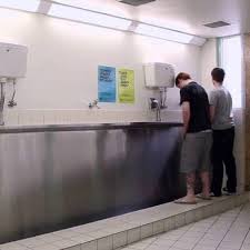 Here's an Idea: A Podcast - I (liane) found this photo with a urinal trough.  What. The. Hell. Also, have you listened to the episode yet? #heresanidea  #podcast #heresanideapodcast #toiletideas #urinaltrough #why |