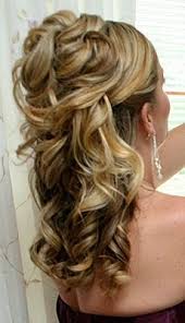 Instead of the veil topping the crown of the head on this wedding hairstyle, hair is gathered into a smooth low bun with the veil tucked in low. Wedding Hairstyles For Medium Length Hair Half Up Half Down Google Search Medium Length Hair Styles Mother Of The Bride Hair Hair Styles