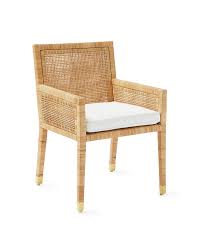We Ve Always Admired Rattan And Its Power To Elevate Without A Lot Of Fuss Here Artisans Start With A Beautifully Proportion Furniture Armchair Dining Chairs