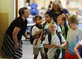 PHOTOS: Smiles, hugs greet students at Lincoln Elementary as Casper schools  open